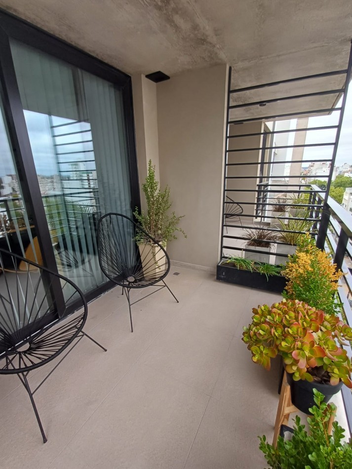 Venta de departamento dos ambientes, con balcon, cochera cubierta. Zona plaza mitre